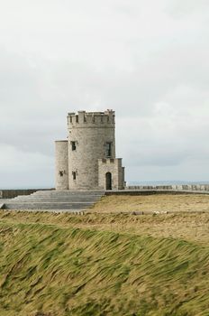 O'Brien's Tower marks the highest point of the Cliffs of Moher in County Clare, Ireland, located a short distance from the village Doolin.
