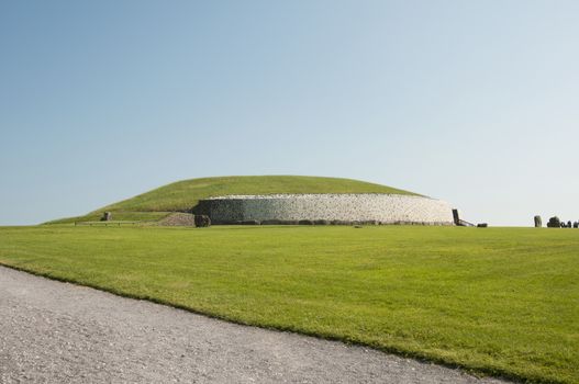 Newgrange is a prehistoric monument in Ireland, It was built about 3200 BC during the Neolithic period, which makes it older than Stonehenge and the Egyptian pyramids.