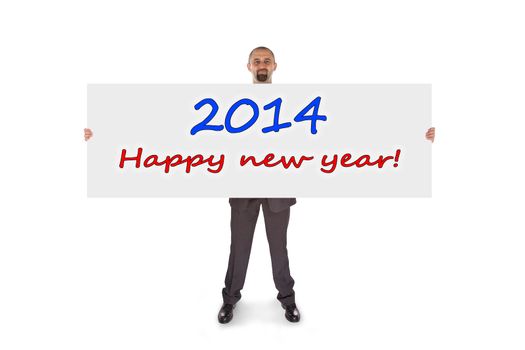 Smiling businessman holding a really big card, isolated on white, happy new year