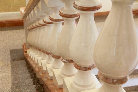 Image of white and gold balustrade pattern