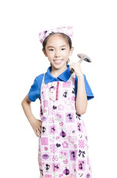 Smiling girl dressed as a cook