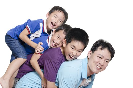 Father playing with children on white background
