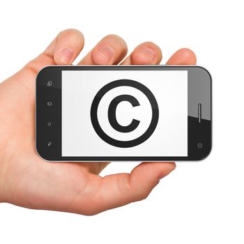 Law concept: hand holding smartphone with Copyright on display. Mobile smart phone in hand on White background, 3d render