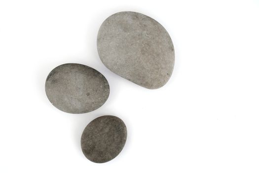 Grey stone pebbles balancing in a stack