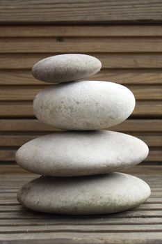Grey stone pebbles balancing in a stack