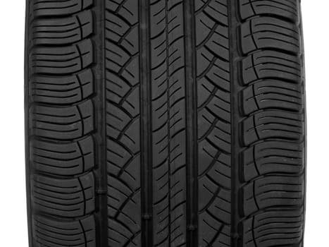 A black rubber tyre isolated against a white background