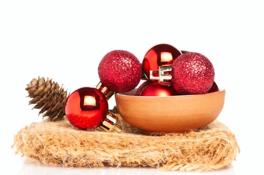 Red baubles with cone isolated on white