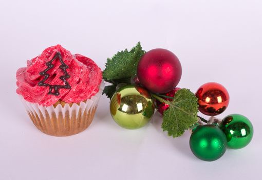 Christmas tree ornament and cupcake with tree