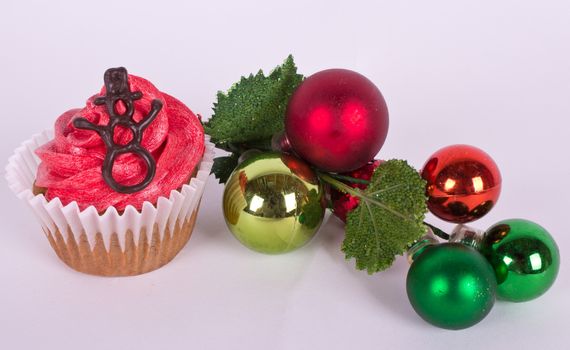 Christmas tree ornament and cupcake with snowman