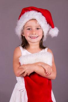 Little girl with her Christmas sock