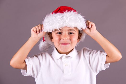 Little boy with Santa hat