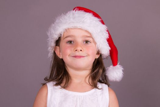 Little girl with Santa hat