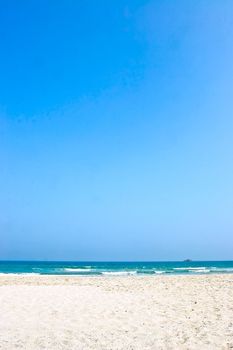 Beach with blue sky and turquoise sea