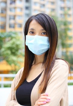 Asian woman wearing face mask