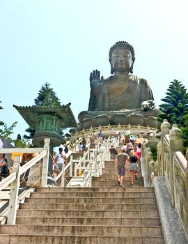 Tian Tan Buddha Statue sitting for people to pay respect which was located at Lantau island in Hong Kong.