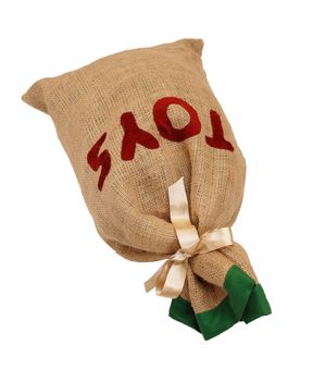 Father Christmas's hessian toy sack tied with a ribbon lying flat, isolated on a white background