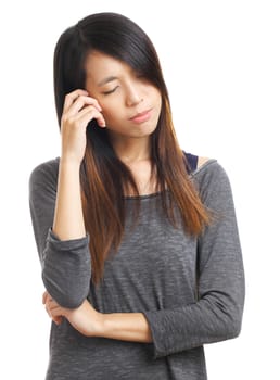 young woman with headache holding head