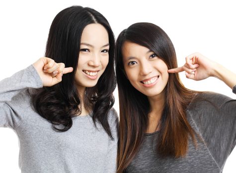 Two asian woman friend smile