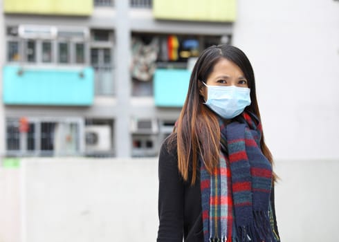 woman wearing protective face mask on street