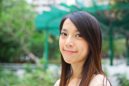 young woman smiling friendly