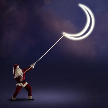 Santa Claus pulls the moon using a rope