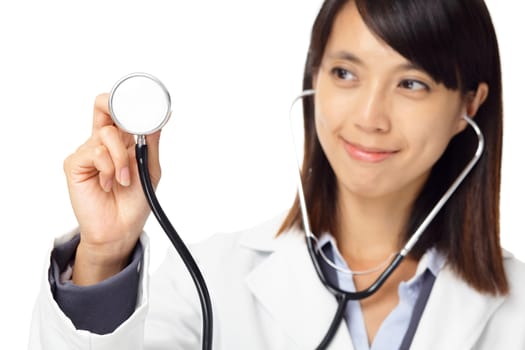 Asian female doctor holding stethoscope