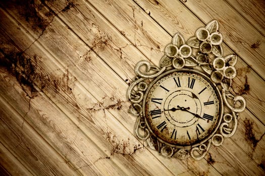 old vintage clock on a wooden floor