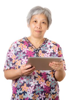 Asian old woman using digital tablet