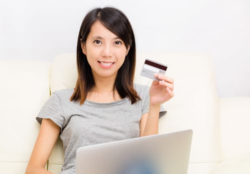 Asian woman with laptop for online shopping