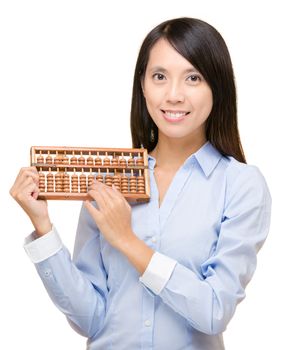 Asian woman holding abacus