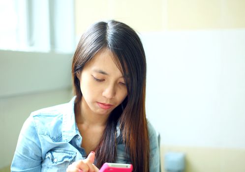 young woman using mobile phone