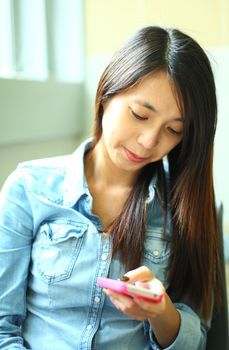 Asian woman using smartphone