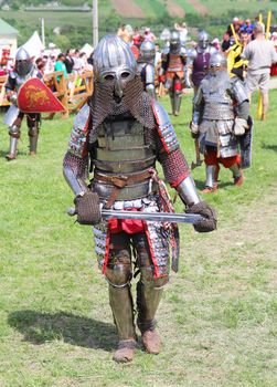 KHOTYN - MAY 10: Knight in armor  during Festival Medieval Khotyn on May 10, Ukraine