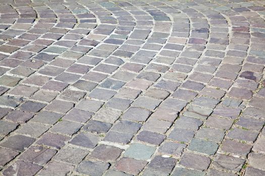 Grey cobblestone boulevard background texture