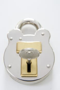 locked padlock with key and room for copy