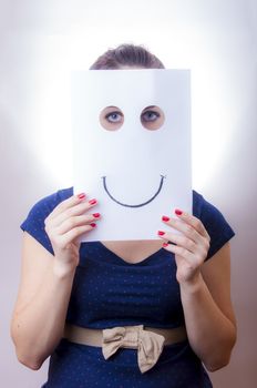 An image of businesswoman holding paper with drown emotions