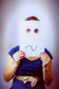 An image of businesswoman holding paper with drown emotions