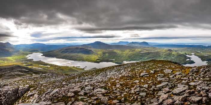 Panoramic view of Scottish highlands in Loch Assynt area, United Kingdom
