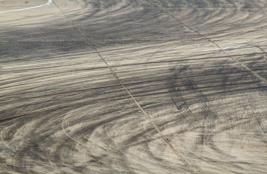 Background with tire marks on road track