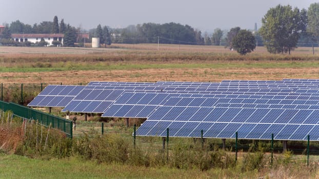 large solar panel system installed on an open field