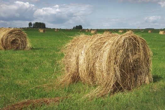 Straw bales on field before the storm