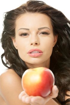 Sexy woman with red apple