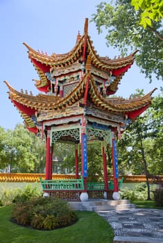 Traditional chinese garden with pavilon of harmony