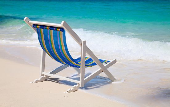 Colorful chair on the white sandy beach