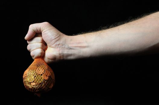 Trapped Money And an Hand on a Black Background