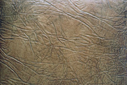 Texture artificial light beige leather close-up