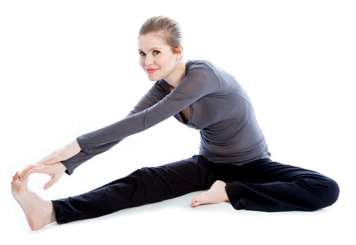 Attractive caucasian woman wearing a sport outfit in her 30 isolated on a white background