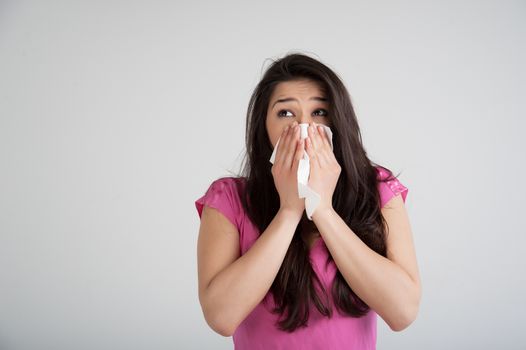 allergies, the common cold, flu-woman sneezes.