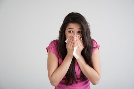 allergies, the common cold, flu-woman sneezes.