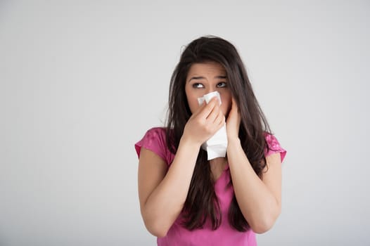 allergies, the common cold, flu-woman sneezes.